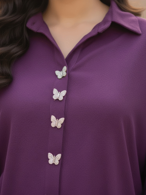 berry dream neckline is adorned with butterfly buttons.